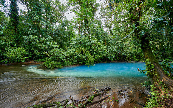 the confluence of two rivers the blue river Rio Celeste is formed
