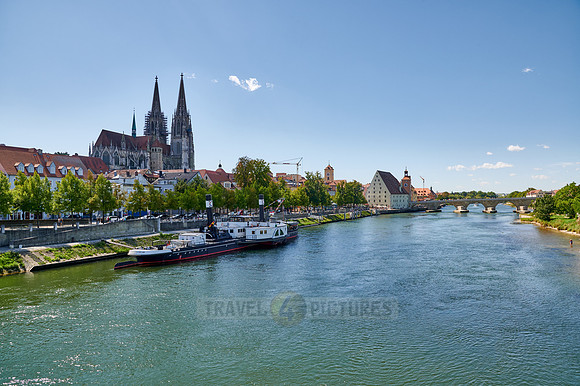 The St. Peter  Cathedral with the RUTHOF / ÉRSEKCSANÁD Ship Museum on River Danube in the foreground