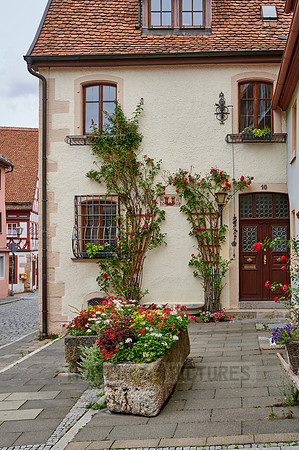flowered facade in the old town of Rothenburg ob der Tauber