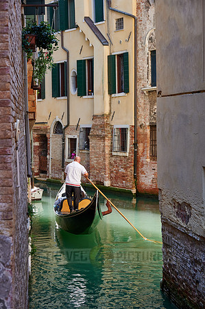 typical small canal and buildings in Venice