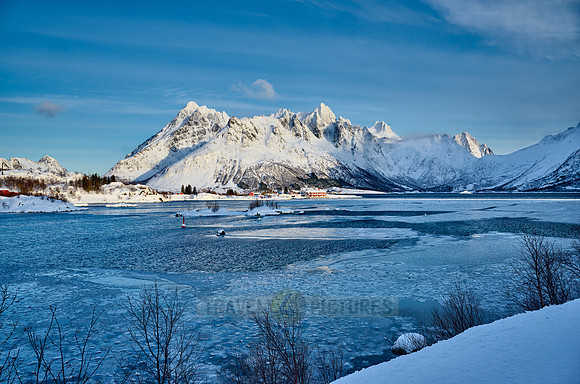 Winter landscape with mountains and sea at the viewpoint of Austnesfjorden