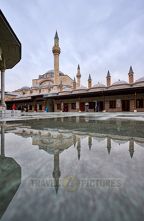 outside view of museum of Mevlana Rumi with Selimiye Mosque behind