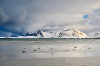 winter landscape with sea and mountains at Sandbotnen, Lofoten