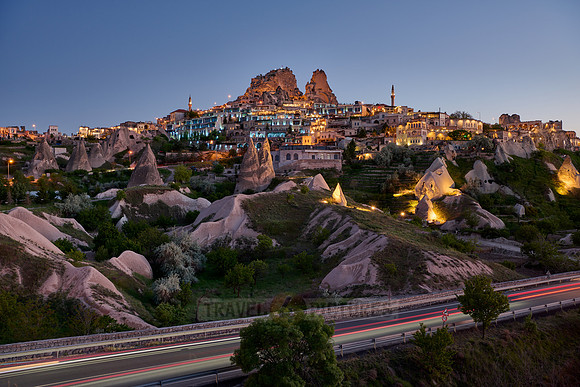 Twilight photo of the perforated castle rock of Uçhisar