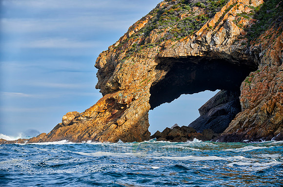 cliffs and cave at coastline