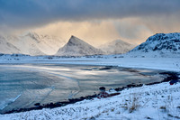 winter landscape with sea and mountains at Sandbotnen, Lofoten