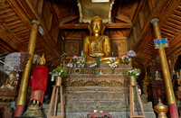 main golden Buddha statue inside Shwe Yaungwe monastery