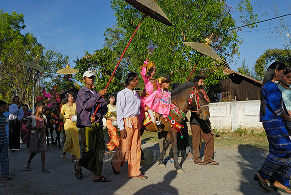 colourful procession because of children starting a monks live