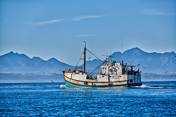 fishing vessel running out for fishing