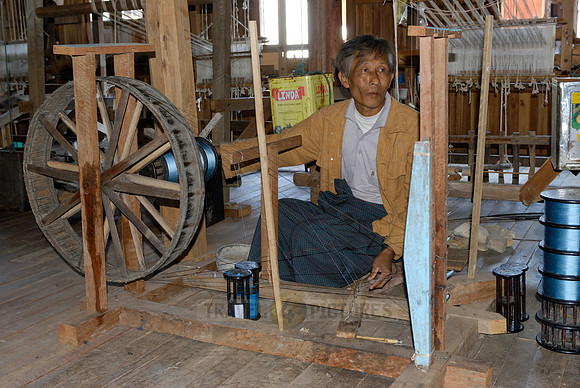 weaving cloth on looms