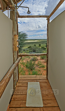 outside shower of room in Polentswa Tented Camp
