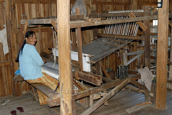 weaving cloth on looms