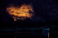 night shot of illuminated Lycian rock tombs in a rock face of Dalyan