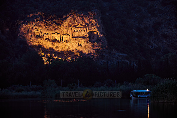 night shot of illuminated Lycian rock tombs in a rock face of Dalyan