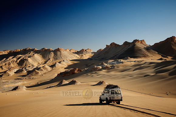 4x4 off road car drive across desert landscape