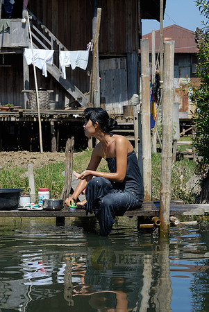 locals washing themself in the lake
