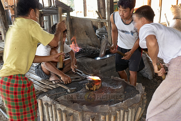 blacksmith beating iron