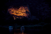 night shot of illuminated Lycian rock tombs in a rock face of Dalyan