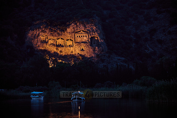 night shot of illuminated Lycian rock tombs in a rock face of Dalyan