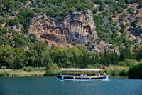 Tourist ship in front of Lycian rock tombs