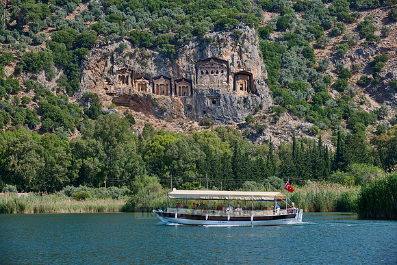 Tourist ship in front of Lycian rock tombs