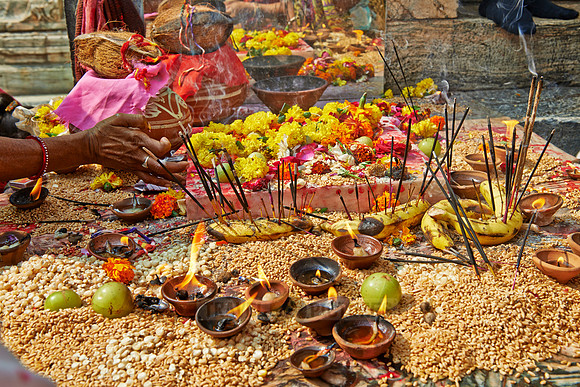 colorful hindu women during ceremony