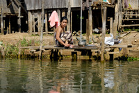 locals washing themself in the lake
