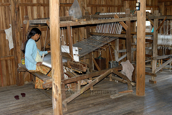 weaving cloth on looms