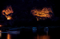 night shot of illuminated Lycian rock tombs in a rock face of Dalyan