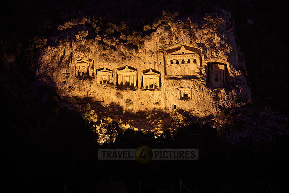 night shot of illuminated Lycian rock tombs in a rock face of Dalyan