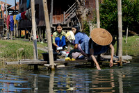 locals washing themself in the lake
