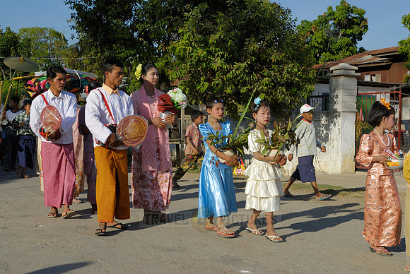 colourful procession because of children starting a monks live