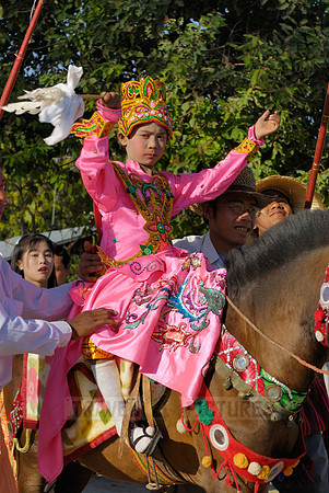 colourful procession because of children starting a monks live