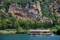 Tourist ship in front of Lycian rock tombs