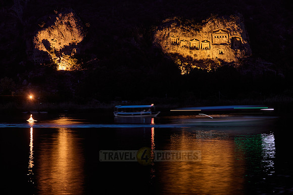 night shot of illuminated Lycian rock tombs in a rock face of Dalyan