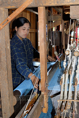 weaving cloth on looms