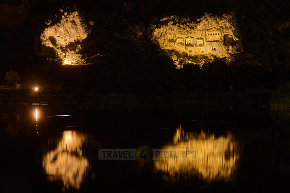 night shot of illuminated Lycian rock tombs in a rock face of Dalyan