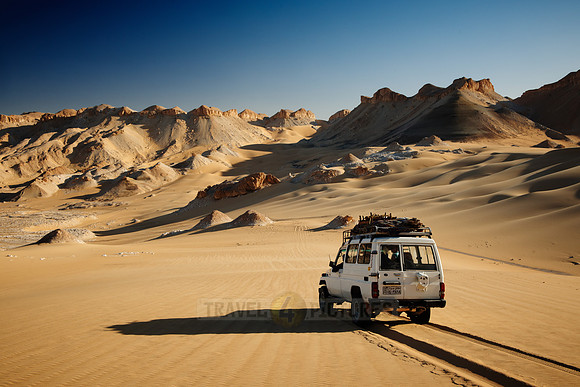 4x4 off road car drive across desert landscape
