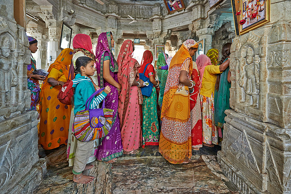 colorful hindu women during ceremony