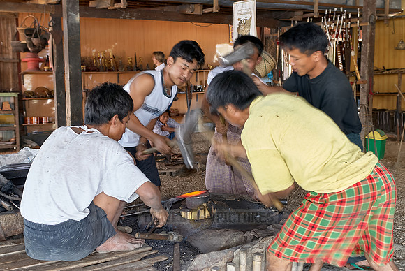 blacksmith beating iron