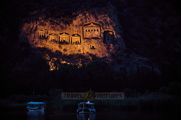night shot of illuminated Lycian rock tombs in a rock face of Dalyan