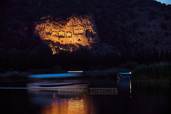 night shot of illuminated Lycian rock tombs in a rock face of Dalyan