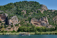 Tourist ship in front of Lycian rock tombs