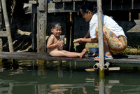 locals washing themself in the lake