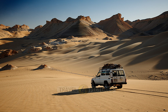 4x4 off road car drive across desert landscape