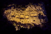 night shot of illuminated Lycian rock tombs in a rock face of Dalyan