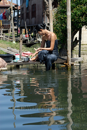 locals washing themself in the lake