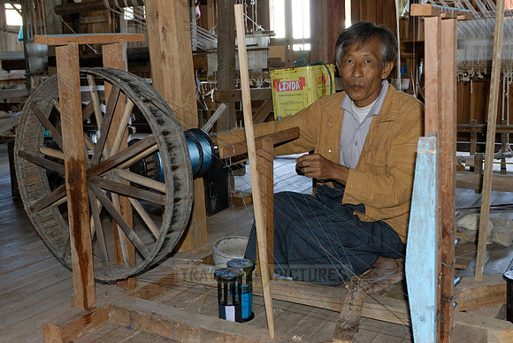 weaving cloth on looms
