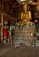 main golden Buddha statue inside Shwe Yaungwe monastery
