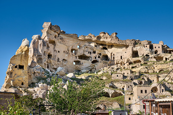 underground dwellings at rock wall of Cavusin